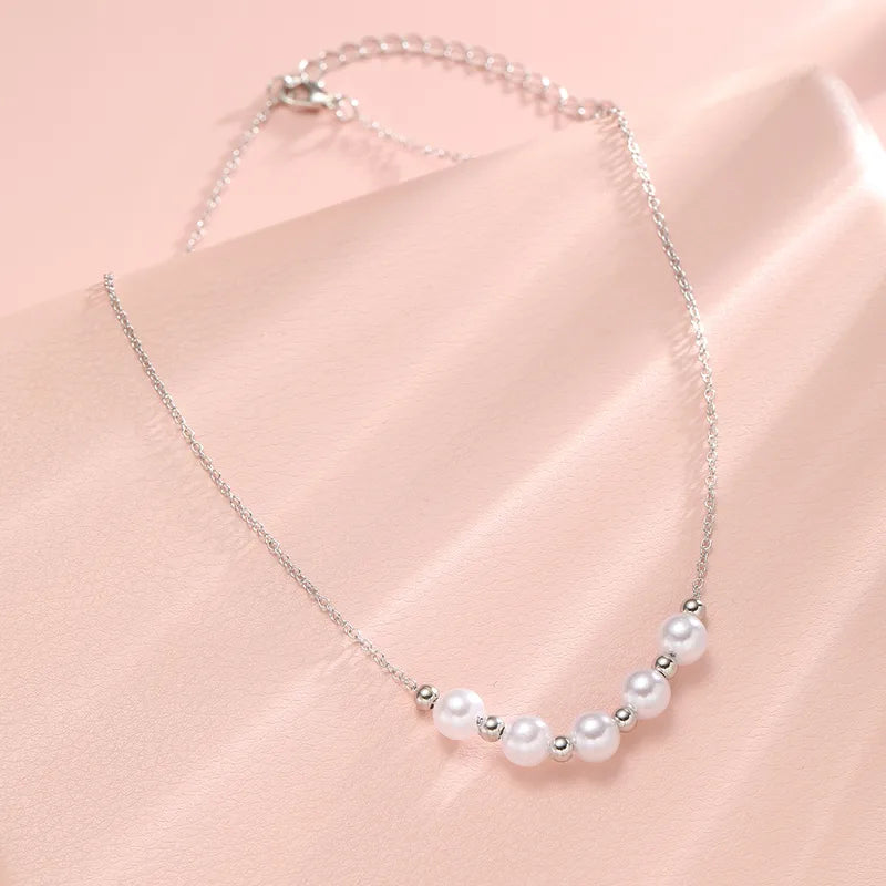 Silver necklace white pearls