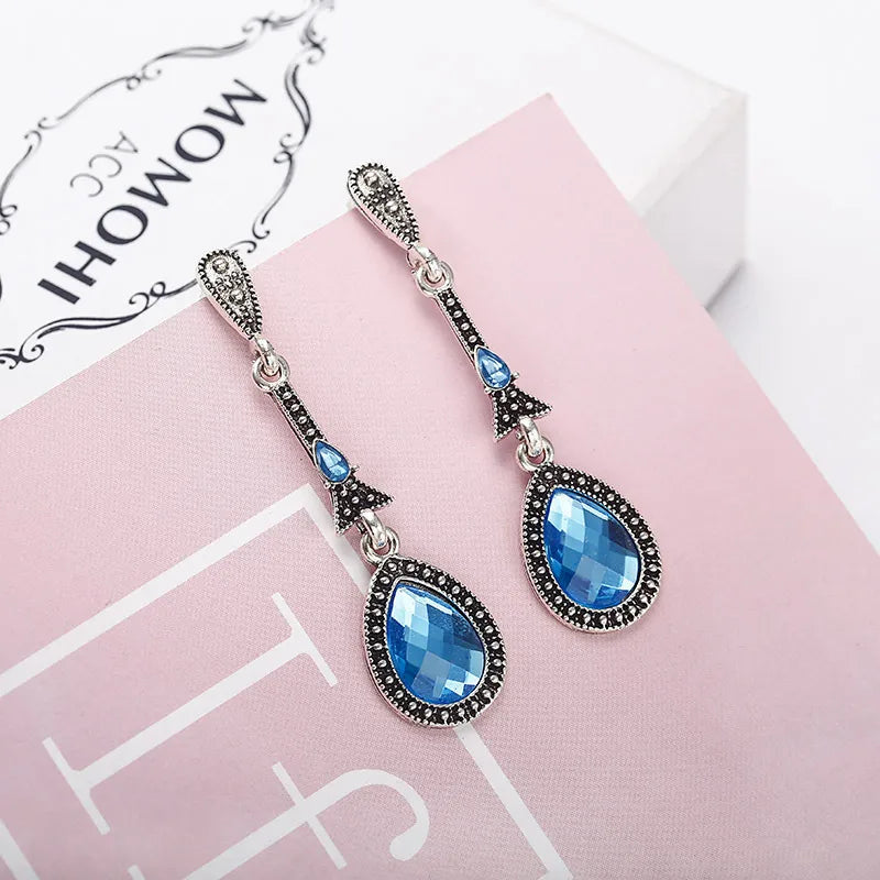 Silver earring blue rhinestone