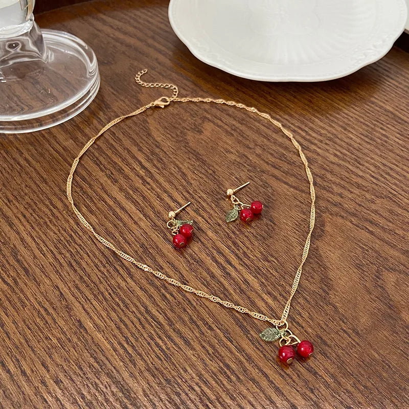 Gold chain cherry pendant