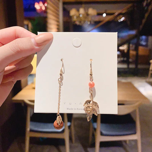 Gold and pink leaf earring