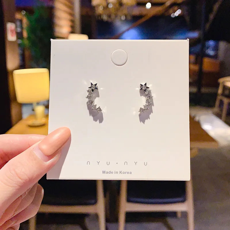 Silver shooting star earring