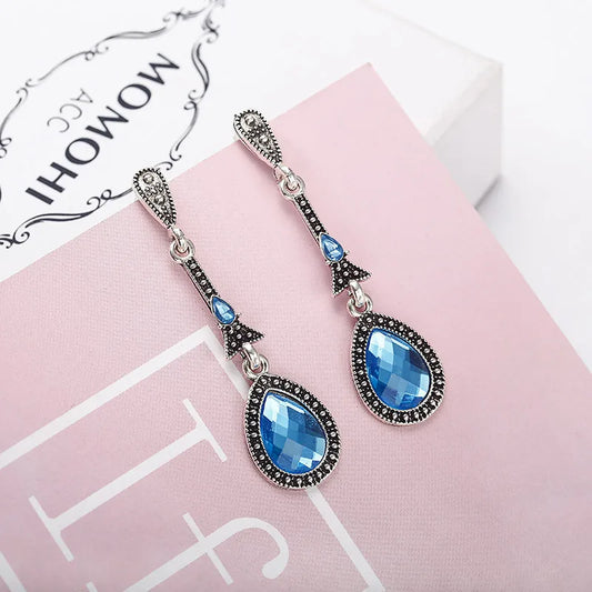 Silver earring blue rhinestone