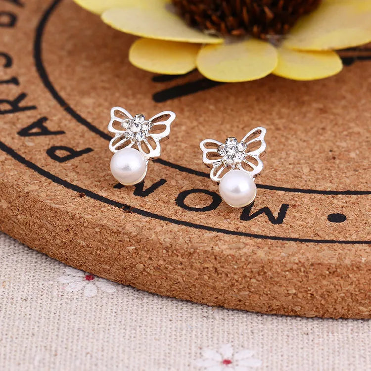 Silver butterfly white pearl earring