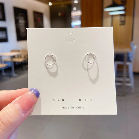 Simple silver ring style earring