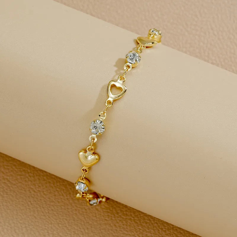 Silver heart shaped alloy bracelet