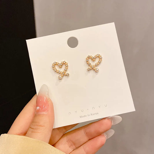 Gold heart cross  pearly earring