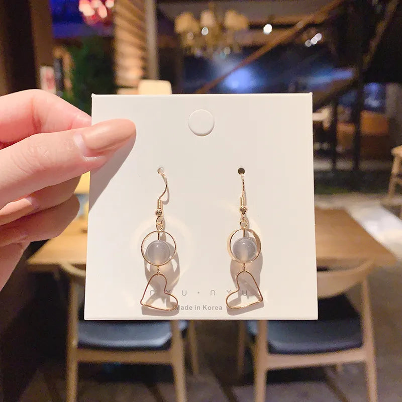 Dangling Gold earring heart hollow