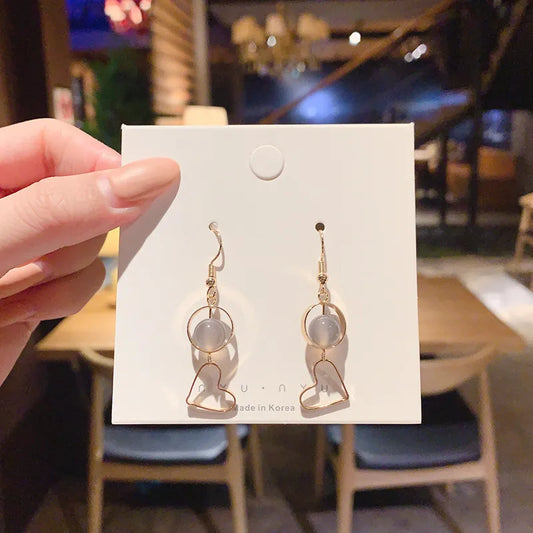Dangling Gold earring heart hollow