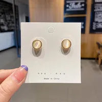 Gold Pearl  style earring