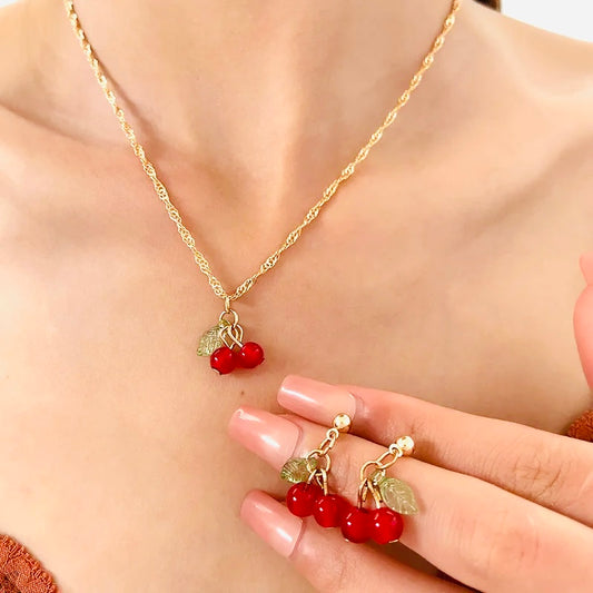 Gold chain cherry pendant